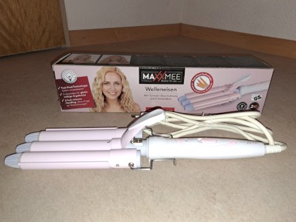 Neuwertiges Haarwelleneisen